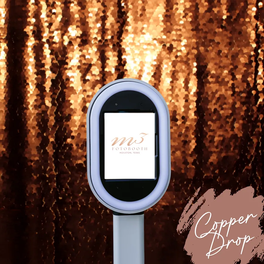 The Copper Drop Sequins backdrop behind an M3 Fotobooth booth