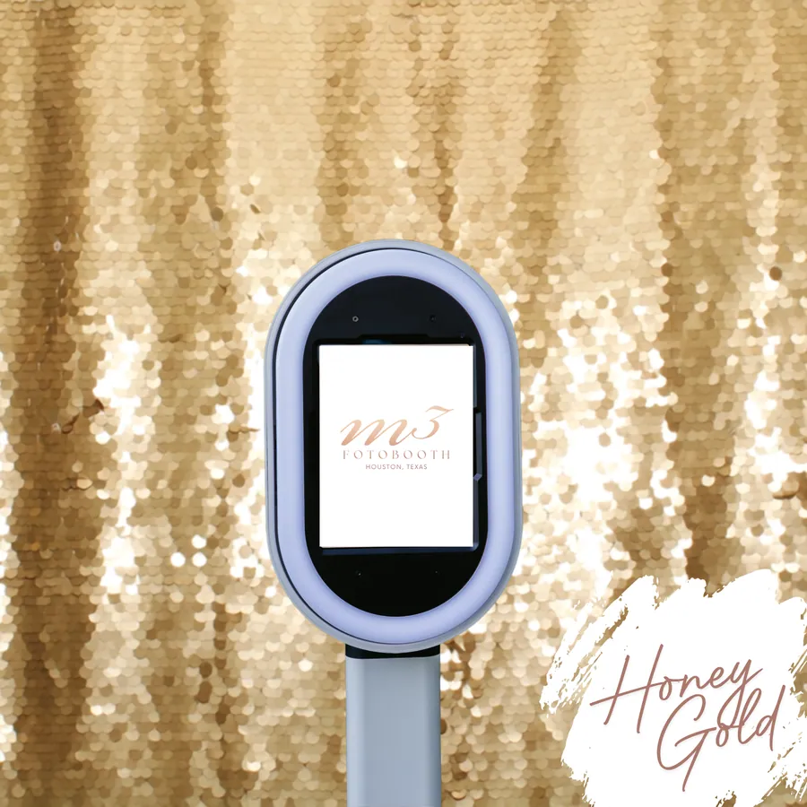 The Honey Gold Sequins backdrop behind an M3 Fotobooth booth
