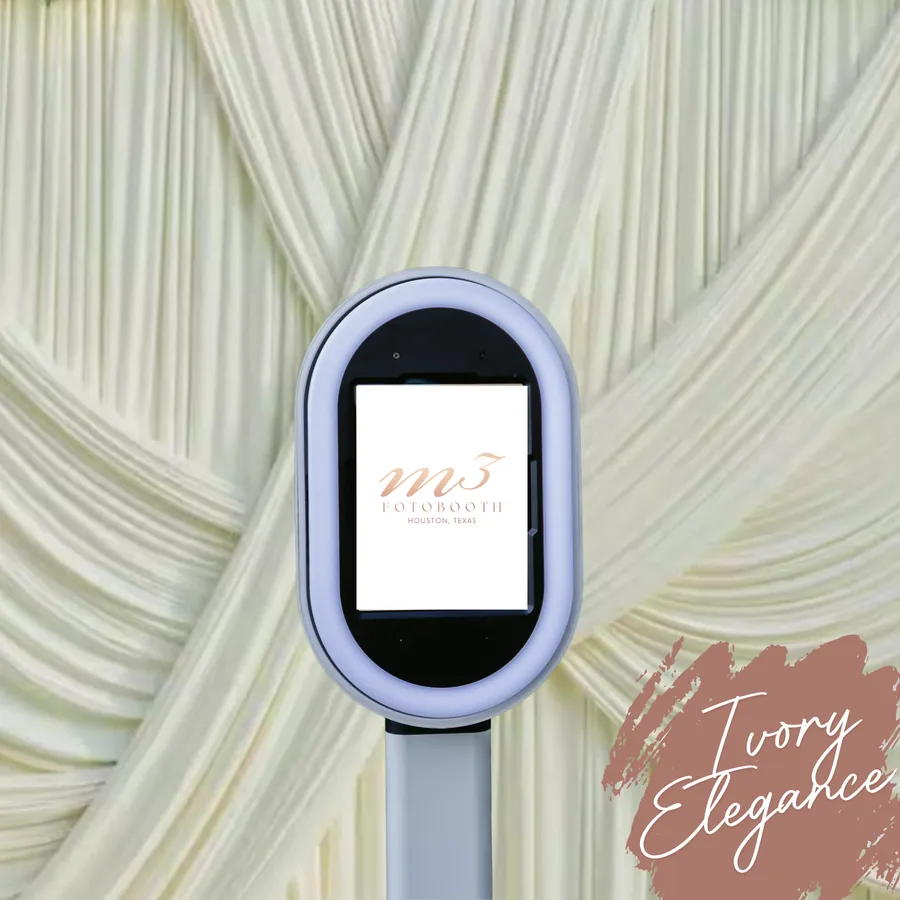The Ivory Elegance backdrop behind an M3 Fotobooth booth